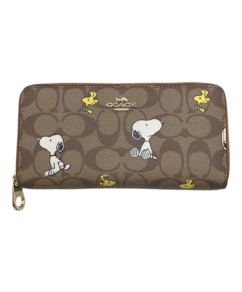 COACH（コーチ）COACH (コーチ) PEANUTS (ピーナッツ) コラボシグネチャーロングウォレット ブラウンの古着・服飾アイテム