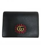 GUCCIグッチ）の古着「ビジュー2つ折りコンパクトウォレット」｜ブラック