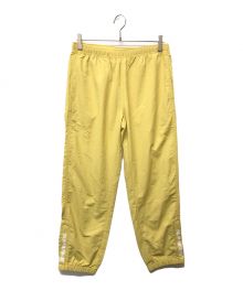 SUPREME（シュプリーム）の古着「WARM UP PANTS」｜イエロー