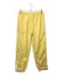 Supreme（シュプリーム）の古着「WARM UP PANTS」｜イエロー