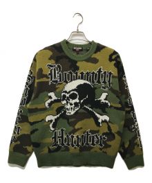 BOUNTY HUNTER×SUPREME（バウンティハンター×シュプリーム）の古着「23AW スカルカモフラロゴニットセーター」｜オリーブ