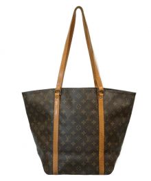 LOUIS VUITTON（ルイ ヴィトン）の古着「サックショッピング ショルダートートバッグ」｜ブラウン