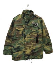 ALPHA×stussy（アルファ×ステューシー）の古着「M-65 フィールドジャケット」｜オリーブ