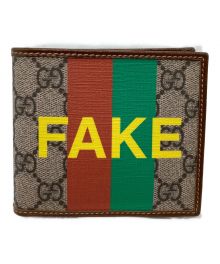 GUCCI（グッチ）の古着「コンパクトウォレット」｜ブラウン