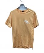 stussyステューシー）の古着「A Go Go TEE」｜オレンジ