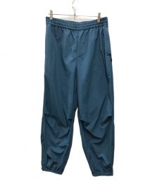 UNIVERSAL PRODUCTS.（ユニバーサルプロダクツ）の古着「NYLON SHELL TRACK PANTS」｜ブルー