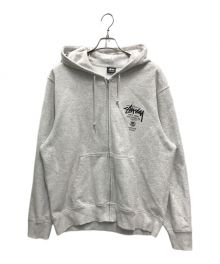 stussy（ステューシー）の古着「WORLD TOUR ZIP HOOD(ワールド　ツアー ジップ フード)」｜グレー