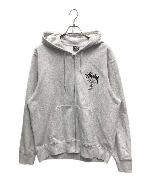 stussy（ステューシー）stussy (ステューシー) WORLD TOUR ZIP HOOD(ワールド　ツアー ジップ フード) グレー サイズ:Lの古着・服飾アイテム