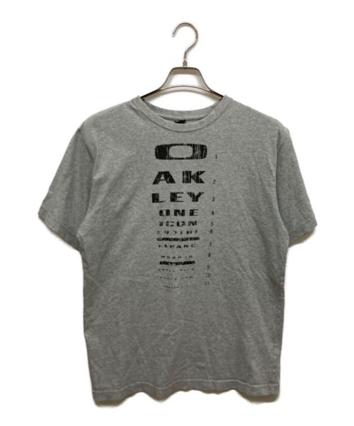 OAKLEY（オークリー）OAKLEY (オークリー) プリントTシャツ グレー サイズ:Mの古着・服飾アイテム