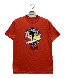 stussy（ステューシー）の古着「surfing board Tee / サーフボードT クルーネック プリント コットン」｜レッド