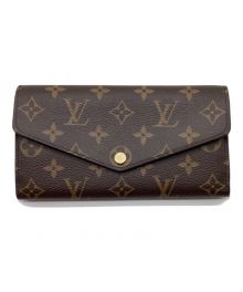 LOUIS VUITTON（ルイ ヴィトン）の古着「長財布　ポルトフォイユ・サラ　フューシャ　モノグラム」｜フューシャ