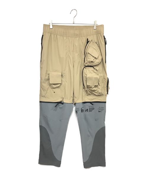 NIKE（ナイキ）NIKE (ナイキ) NRG ISPA PANTS 切替ナイロンパンツ ベージュ×グレー サイズ:XLの古着・服飾アイテム