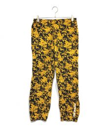 SUPREME（シュプリーム）の古着「20SS Warm Up Pant Black Floral イージーパンツ」｜ブラック×イエロー