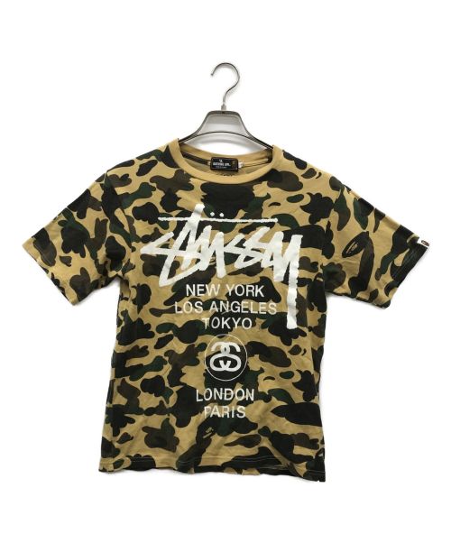 A BATHING APE（アベイシングエイプ）A BATHING APE (ア ベイシング エイプ) stussy (ステューシー) 迷彩柄Tシャツ ブラウン サイズ:Sの古着・服飾アイテム