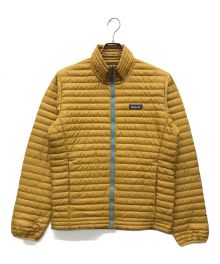 Patagonia（パタゴニア）の古着「ダウンジャケット」｜ベージュ