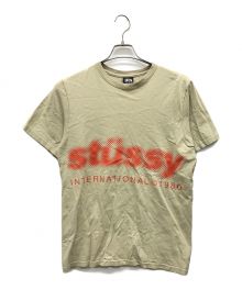 stussy（ステューシー）の古着「プリントTシャツ」｜ベージュ