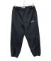 COOTIE PRODUCTIONS（クーティープロダクツ）の古着「Polyester Twill Track Pants」｜ブラック