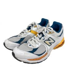 NEW BALANCE（ニューバランス）の古着「ローカットスニーカー」｜ホワイト×イエロー