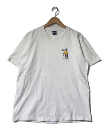 stussy（ステューシー）の古着「ゴルフマンTシャツ」｜ホワイト