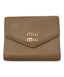 MIU MIU（ミュウミュウ）の古着「3つ折り財布」｜ベージュ