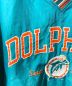 中古・古着 Champion (チャンピオン) DOLPHINS ナイロンプルオーバー グリーン サイズ:L：6800円