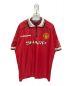 UMBRO（アンブロ）の古着「Manchester United Game Shirt」｜レッド