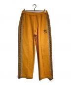 PUMA×SASQUATCHfabrix.プーマ×サスクワッチファブリックス）の古着「別注TRACK PANTS」｜オレンジ