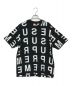 SUPREME（シュプリーム）の古着「intarsia spellout s/s top」｜ブラック