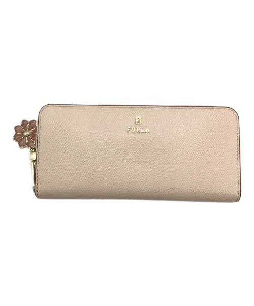 FURLA（フルラ）FURLA (フルラ) チャーム付ラウンドジップウォレット ライトピンクの古着・服飾アイテム