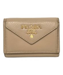 PRADA（プラダ）の古着「コンパクトウォレット」｜ベージュ