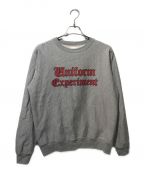 uniform experimentユニフォームエクスペリメント）の古着「GOTHIC LOGO CREWNECK SWEAT」｜グレー