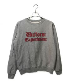 uniform experiment（ユニフォームエクスペリメント）の古着「GOTHIC LOGO CREWNECK SWEAT」｜グレー