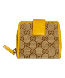 GUCCI（グッチ）の古着「GG キャンバス レザー スモール ラウンド ジップ ウォレット」｜イエロー×ベージュ