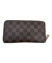 LOUIS VUITTON（ルイ ヴィトン）の古着「ダミエ　ジッピーウォレット」｜ブラウン