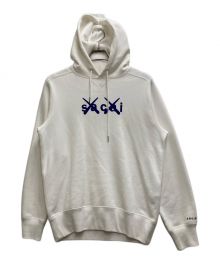 sacai×KAWS（サカイ×カウズ）の古着「Flock Print Hoodie」｜ホワイト