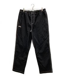 stussy（ステューシー）の古着「NYLON FOLSOM BEACH PANT」｜ブラック