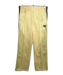 Needles（ニードルズ）の古着「STUDIOUS 別注 Track Pant - Poly Smooth MR444 トラックパンツ」｜イエロー