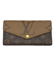 LOUIS VUITTON（ルイ ヴィトン）の古着「ジャイアントモノグラムリバース ポルトフォイユ・サラ 長財布」｜ブラウン