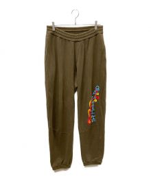 myne（マイン）の古着「”THE HIPPEST TRIP" Printed Track Pants」｜ブラウン