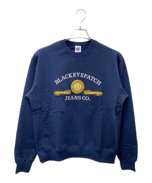 BlackEyePatch（ブラックアイパッチ）BlackEyePatch (ブラックアイパッチ) CURRENSY EMBLEM CREW SWEAT ネイビーベージュ サイズ:SIZE Sの古着・服飾アイテム