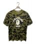 A BATHING APE（アベイシングエイプ）の古着「1st Camo College Tee」｜グリーン