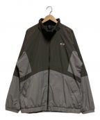 OAKLEYオークリー）の古着「WIND JACKET」｜グレー