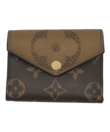 LOUIS VUITTON（ルイ ヴィトン）の古着「ポルトフォイユ ゾエ モノグラム ジャイアント リバースコンパクトウォレット M80725」