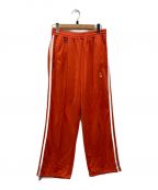 doubletダブレット）の古着「VINTAGE EFFECT TRACK PANTS ヴィンテージ エフェクト トラックパンツ 23AW29PT237」｜オレンジ