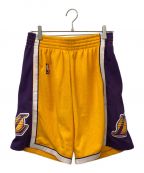 MITCHELL & NESSミッチェルアンドネス）の古着「NBA SWINGMAN SHORTS」｜イエロー