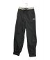 UMBRO（アンブロ）の古着「NYLON TRACK PANTS」｜ブラック