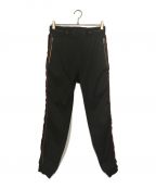 GIVENCHYジバンシィ）の古着「Velvet-trim Logo-waistband Jogger Pants」｜ブラック×レッド