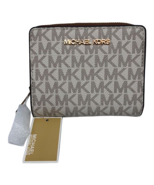 MICHAEL KORS（マイケルコース）MICHAEL KORS (マイケルコース) シグネチャーコンパクトウォレット ブラウン 未使用品の古着・服飾アイテム