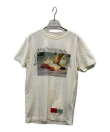 HERON PRESTON×SAMI MIRO VINTAGE（ヘロンプレストン×サミミロヴィンテージ）の古着「Grahpic Crewneck Tee」｜アイボリー