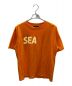 WIND AND SEA（ウィンダンシー）の古着「Tシャツ」｜オレンジ